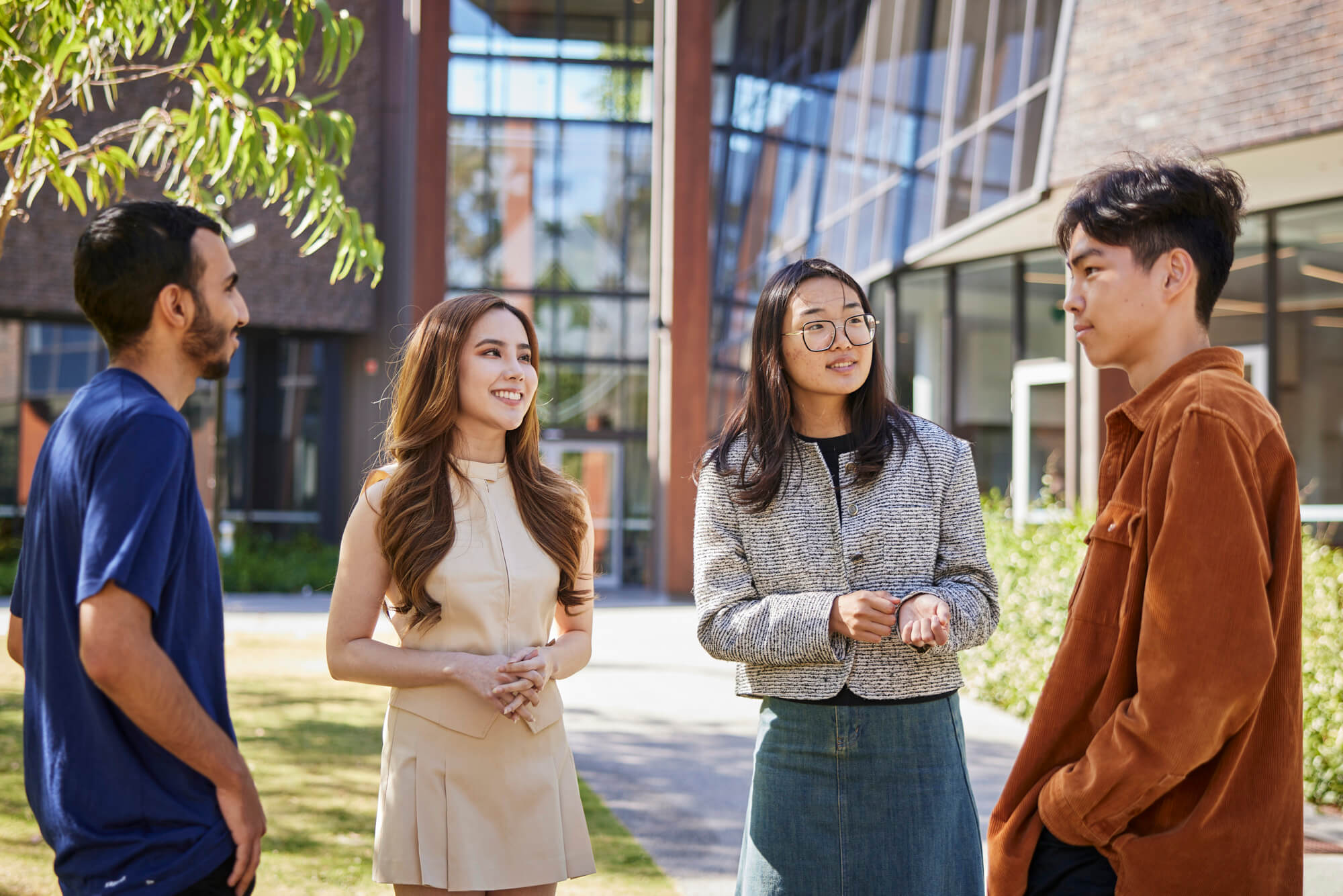 Pathways student walking around campus on a sunny day