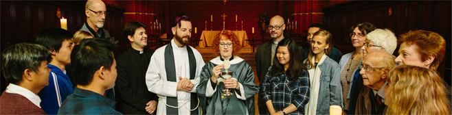 A group of Theological School staff members and students at the Monday program in the Ministry education at the Theological School, Trinity College